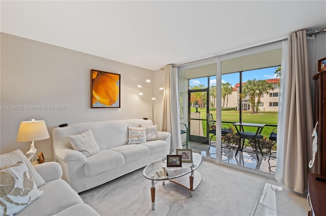 living room with floor to ceiling windows