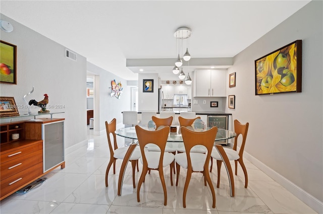 dining space featuring beverage cooler