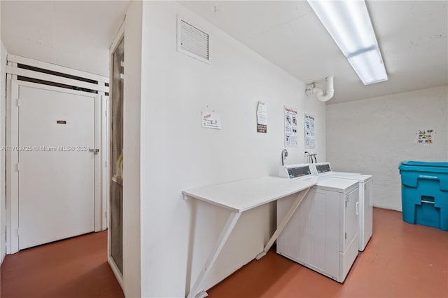 laundry room featuring washer and dryer