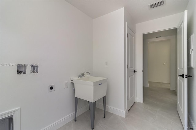 laundry area with hookup for a washing machine, baseboards, visible vents, laundry area, and electric dryer hookup