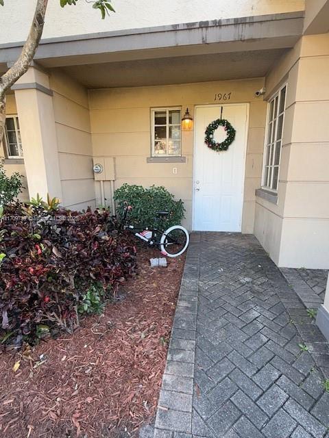 1967 Marsh Harbor Dr Unit 313, Riviera Beach, FL 33404 - view of exterior entry