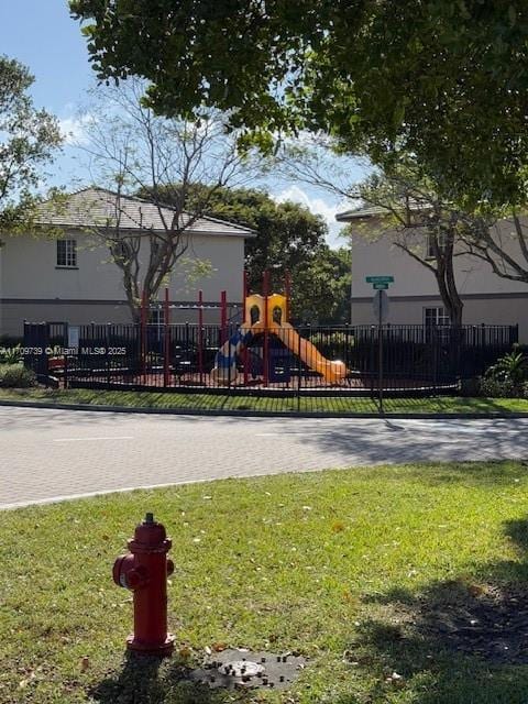 view of jungle gym with a yard