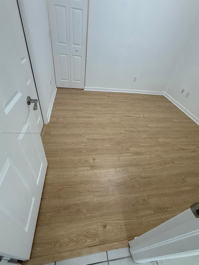 1967 Marsh Harbor Dr Unit 313, Riviera Beach, FL 33404 - unfurnished bedroom with light wood-style flooring