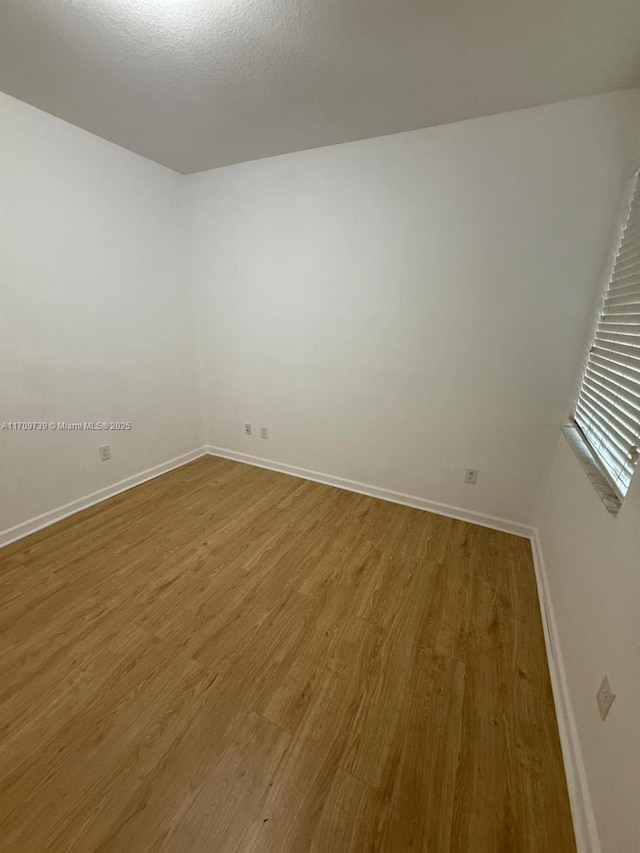 1967 Marsh Harbor Dr Unit 313, Riviera Beach, FL 33404 - unfurnished room featuring light wood-style flooring and baseboards