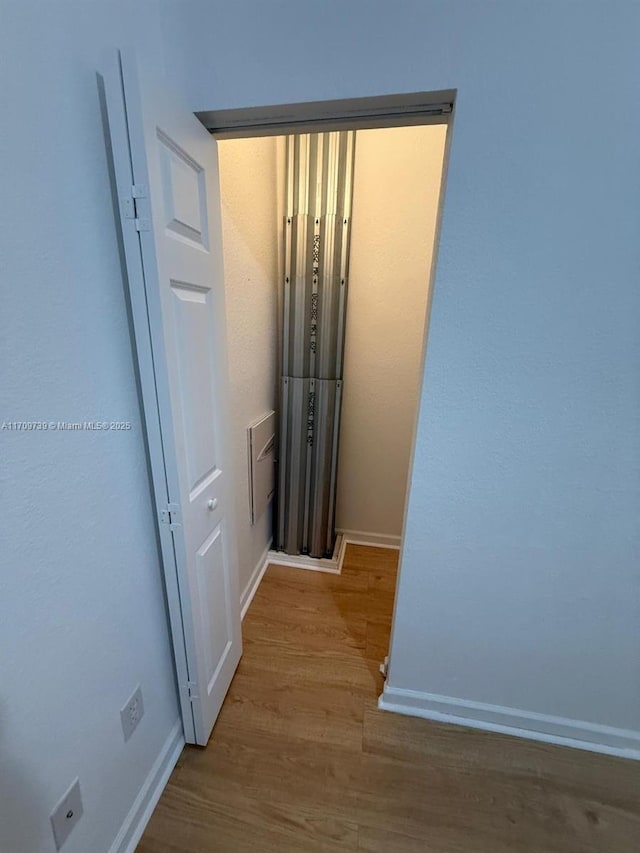 1967 Marsh Harbor Dr Unit 313, Riviera Beach, FL 33404 - hall with wood finished floors and baseboards