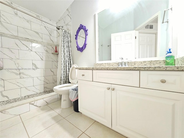 bathroom with a shower with shower curtain, tile patterned flooring, lofted ceiling, and vanity