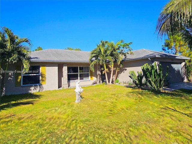 single story home with a front yard