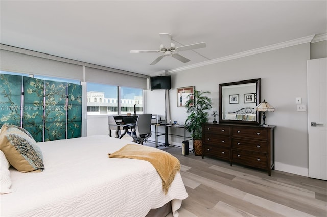 bedroom featuring light hardwood / wood-style flooring, ceiling fan, and ornamental molding