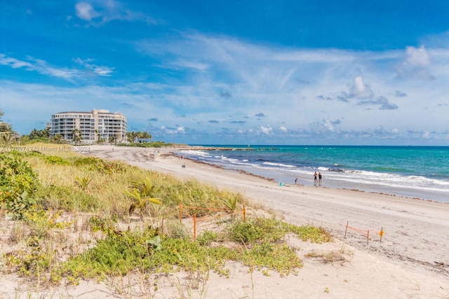 property view of water featuring a beach view