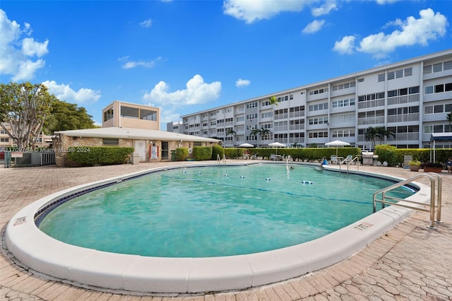 view of pool featuring a patio