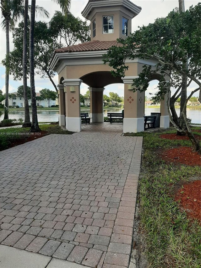 view of home's community with a water view