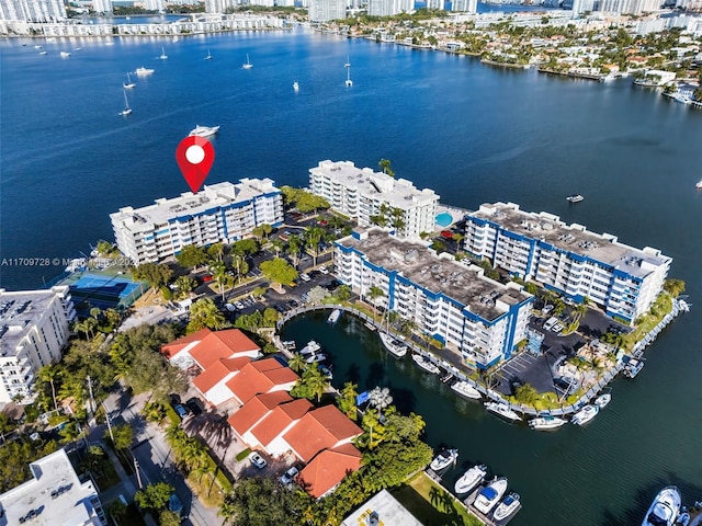 birds eye view of property featuring a water view