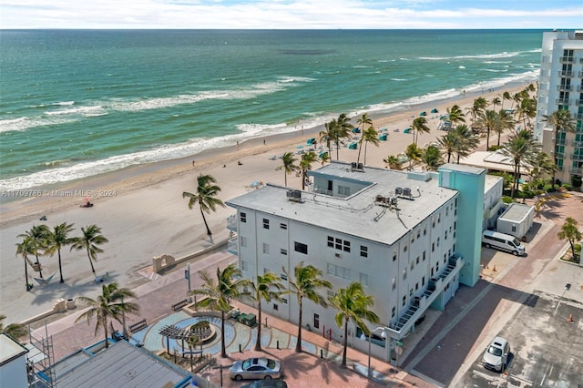 bird's eye view with a view of the beach and a water view