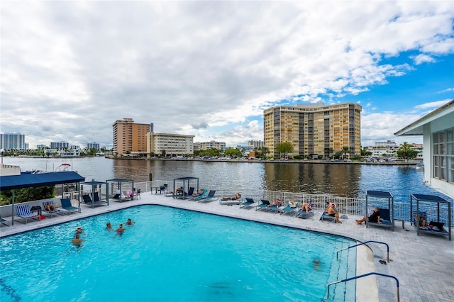 view of swimming pool with a patio