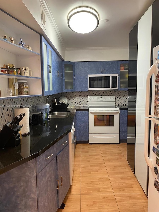 kitchen featuring decorative backsplash, sink, ornamental molding, and appliances with stainless steel finishes