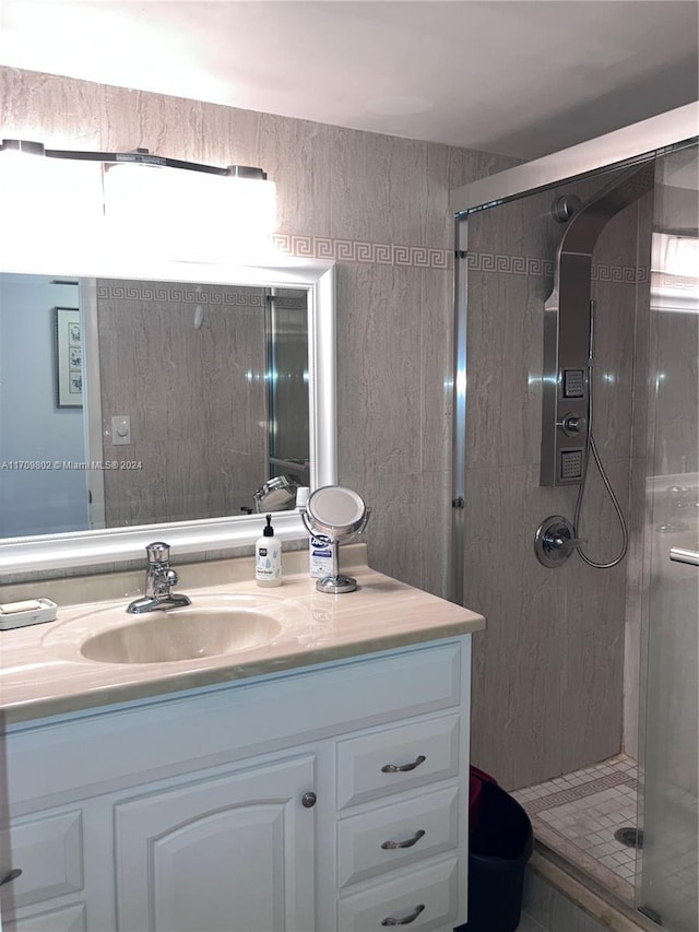 bathroom featuring vanity and walk in shower