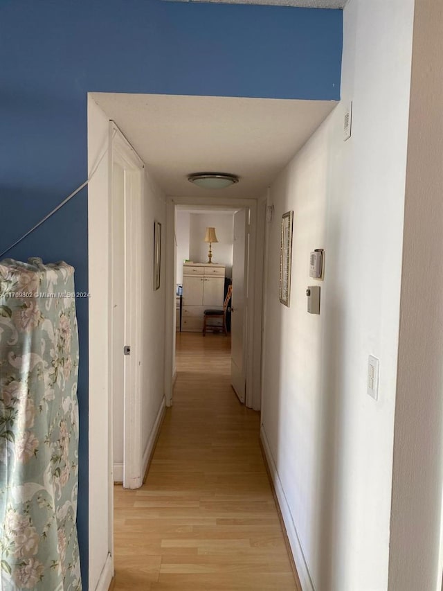 hall featuring light wood-type flooring