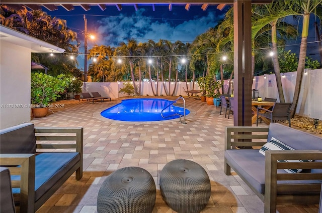 view of swimming pool featuring a patio area and an outdoor hangout area