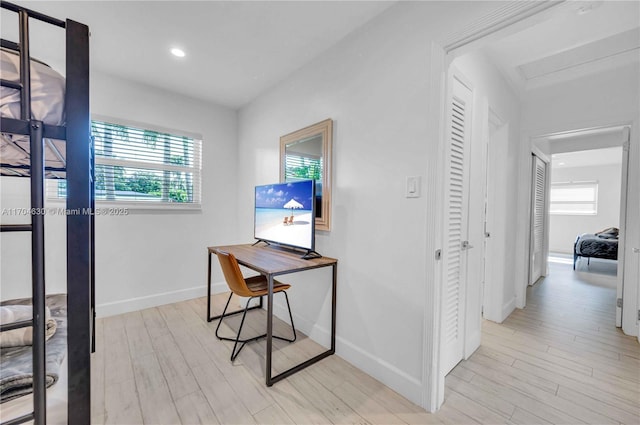 home office featuring light hardwood / wood-style flooring