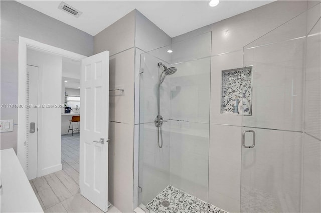 bathroom featuring walk in shower