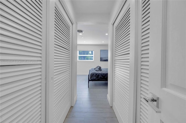 hallway featuring light hardwood / wood-style flooring