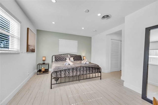 bedroom featuring light hardwood / wood-style floors