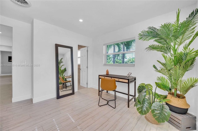 office area featuring light hardwood / wood-style flooring