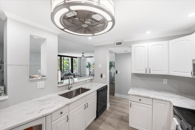 kitchen featuring light stone countertops, stainless steel appliances, ceiling fan, sink, and white cabinets