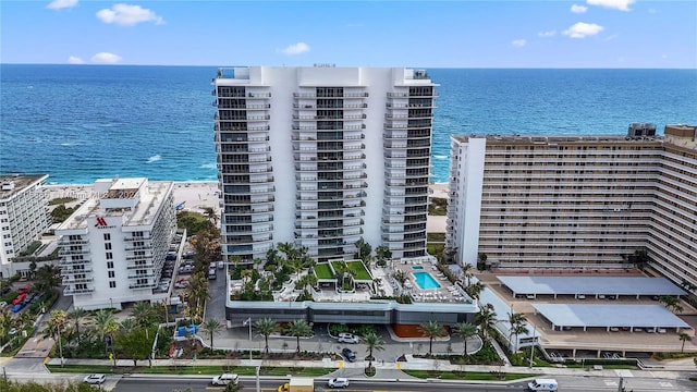 bird's eye view with a view of the beach and a water view