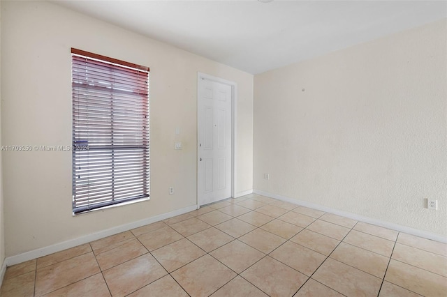 view of tiled empty room