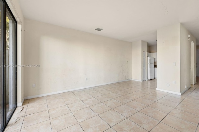 view of tiled spare room