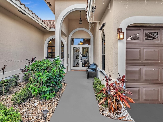 entrance to property featuring french doors