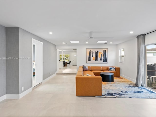 living room featuring ceiling fan