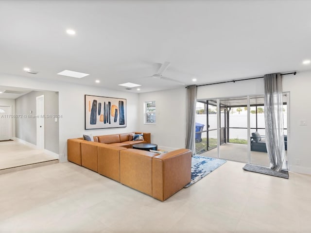 living room with ceiling fan