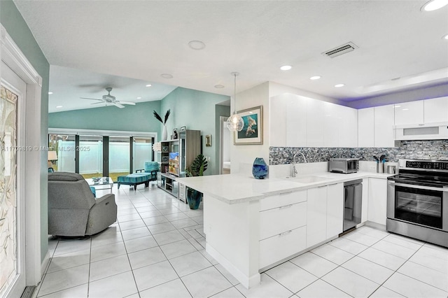 kitchen with a sink, visible vents, dishwasher, a peninsula, and stainless steel electric stove
