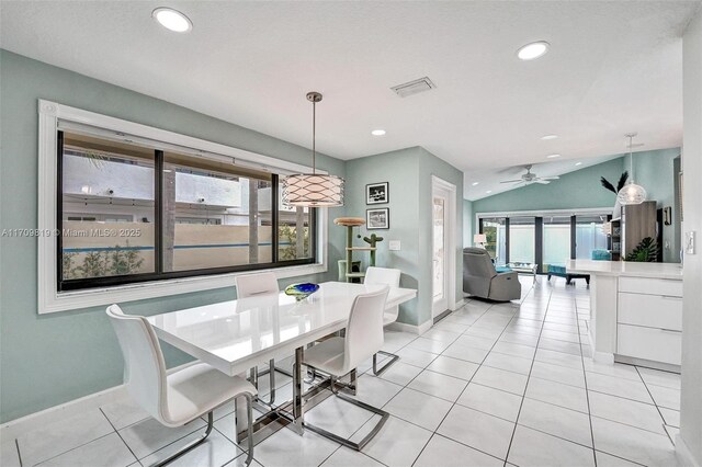 tiled living room with french doors, vaulted ceiling, and ceiling fan