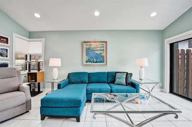 tiled living area featuring recessed lighting and baseboards