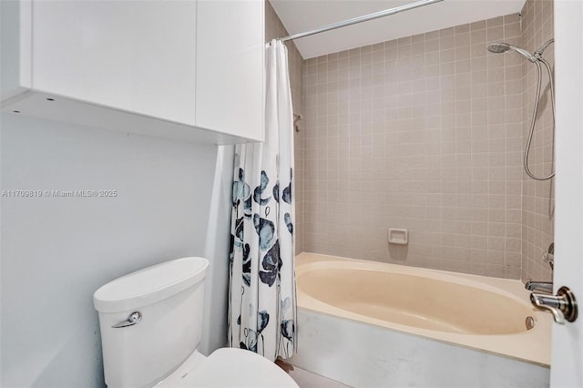 bathroom with toilet and shower / tub combo