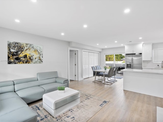 living room featuring light wood-type flooring