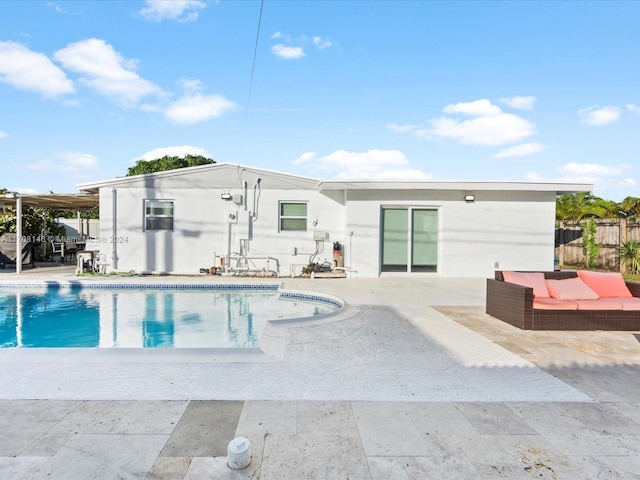 view of pool featuring a patio area