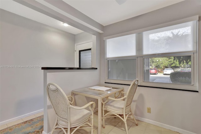 2301 Lucaya Ln Unit M1, Coconut Creek, FL 33066 - tiled dining room with baseboards