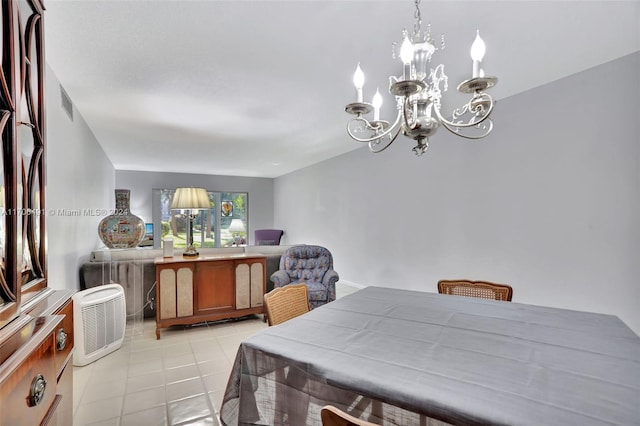 2301 Lucaya Ln Unit M1, Coconut Creek, FL 33066 - dining room with a chandelier and light tile patterned floors