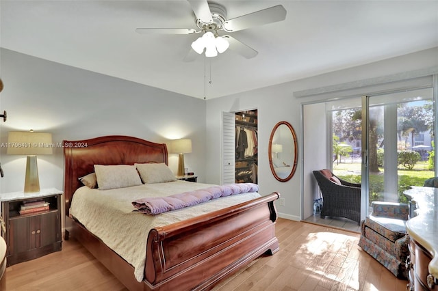 bedroom featuring access to outside, ceiling fan, a closet, and light hardwood / wood-style floors