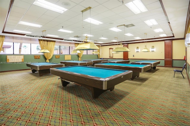 recreation room with carpet, a drop ceiling, ornamental molding, and pool table