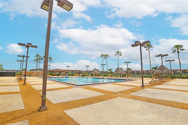 view of swimming pool featuring a patio area