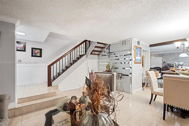 interior space featuring tile patterned flooring, a textured ceiling, and ornamental molding