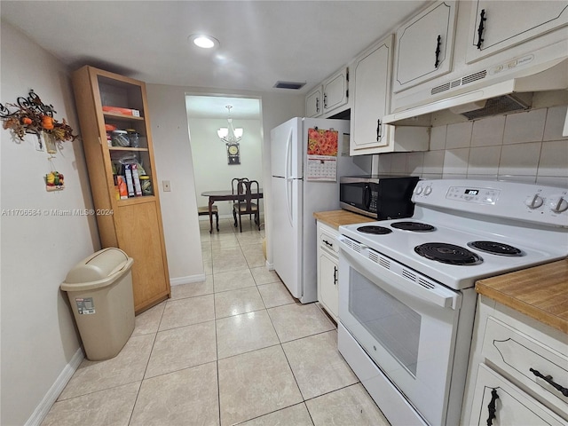 kitchen with white cabinetry, tasteful backsplash, a chandelier, white appliances, and light tile patterned floors