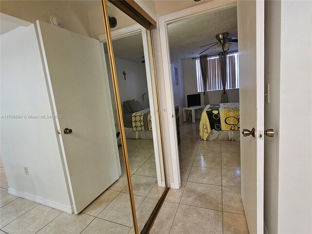 1681 NW 70th Ave Unit 303, Plantation, FL 33313 - hallway featuring light tile patterned flooring