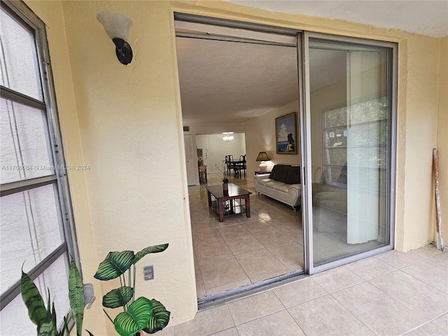 entrance to property with a patio