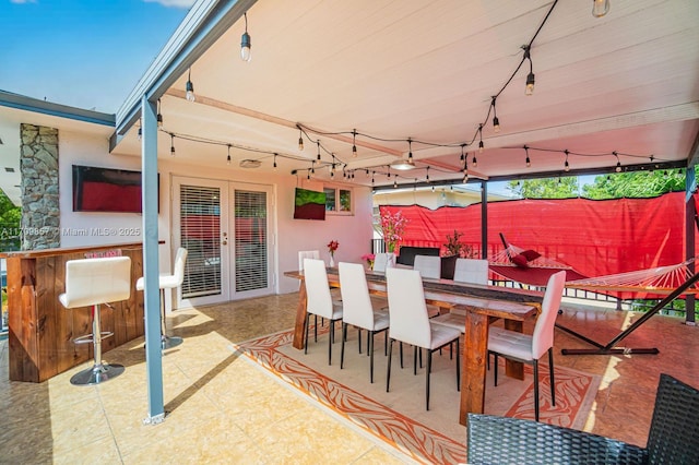 view of patio with a bar